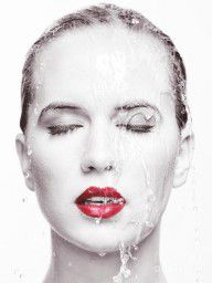 12048842_Artistic_Portrait_Of_Woman_With_Water_Running_Over_Her_Face