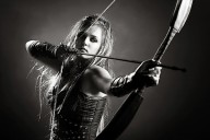 24139118 woman-archer-aiming-arrow-johan-swanepoel