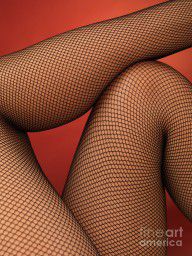 2021718_Woman_Legs_In_Fishnet_Stockings